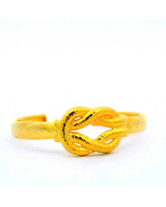 "Heracles Knot" cuff bracelet, hammered and gold-platedin 925 silver.