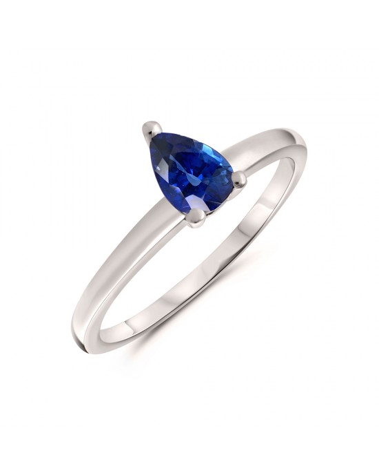 Solitaire engagement ring with blue sapphire in 18k white gold