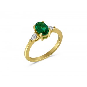Emerald three-stone ring with pear shaped diamonds in 18k gold