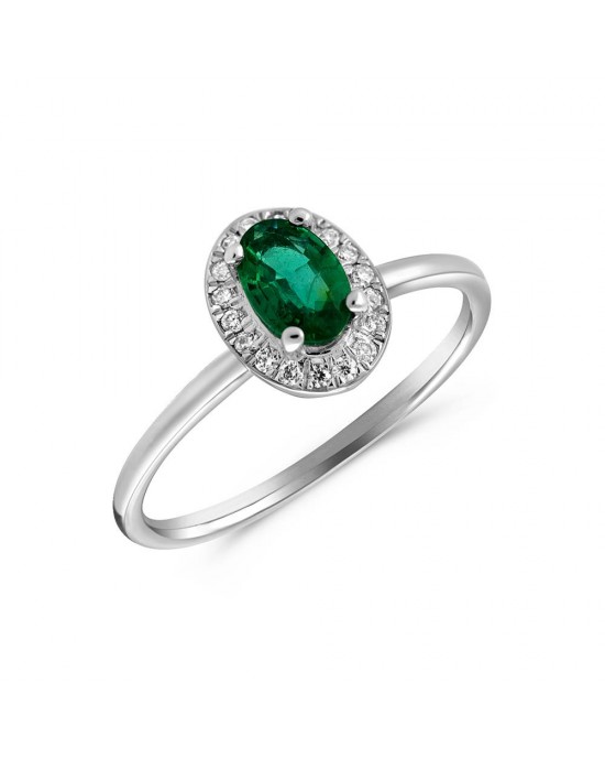 Cluster ring with oval emerald and diamonds in 18k white gold