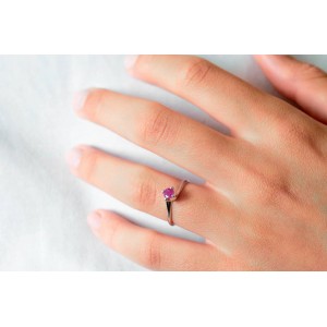 Swirl solitaire engagement ring with ruby in 18k white gold