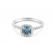 Μονόπετρο δαχτυλίδι halo λευκόχρυσο Κ18 με κεντρικό μπλε διαμάντι 0.35ct
