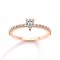 Solitaire engagement ring with 0.16ct pear brilliant cut diamond with side stones in 18k rose gold