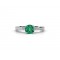 Emerald engagement ring with side stones in 18k white gold