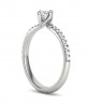 Swirl engagement ring with 0.28ct diamond and side stones in 18k white gold