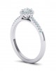 Halo engagement ring with diamond and side stones in 18k white gold