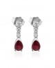 Dangling ruby earrings with diamonds in 18k white gold