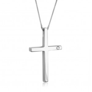 Cross with a diamond in 14k white gold