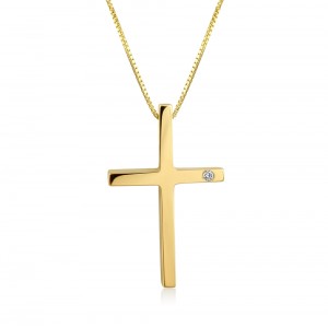 Cross with a diamond in 14k gold