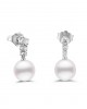 Hanging earrings with round pearls and diamonds in 18k white gold