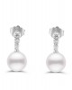 Hanging earrings with round pearls and diamonds in 18k white gold